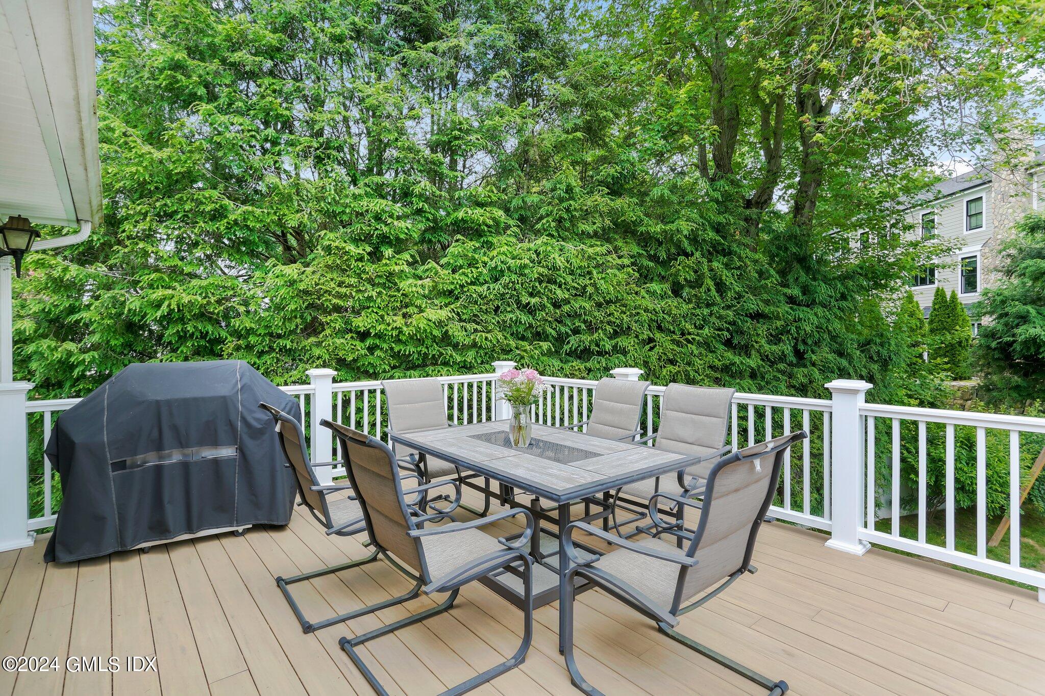 565 River Road Cos Cob, CT 06870 - Photo 12 of 29 a view of balcony with furniture and wooden floor
