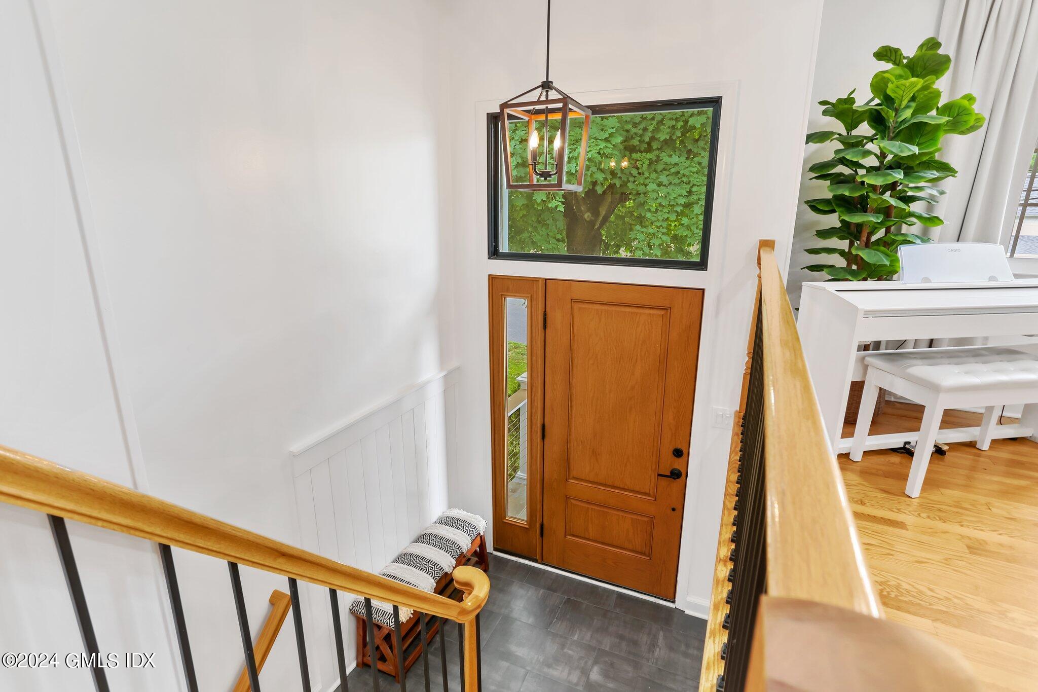565 River Road Cos Cob, CT 06870 - Photo 2 of 29 a view of an entryway with hardwood