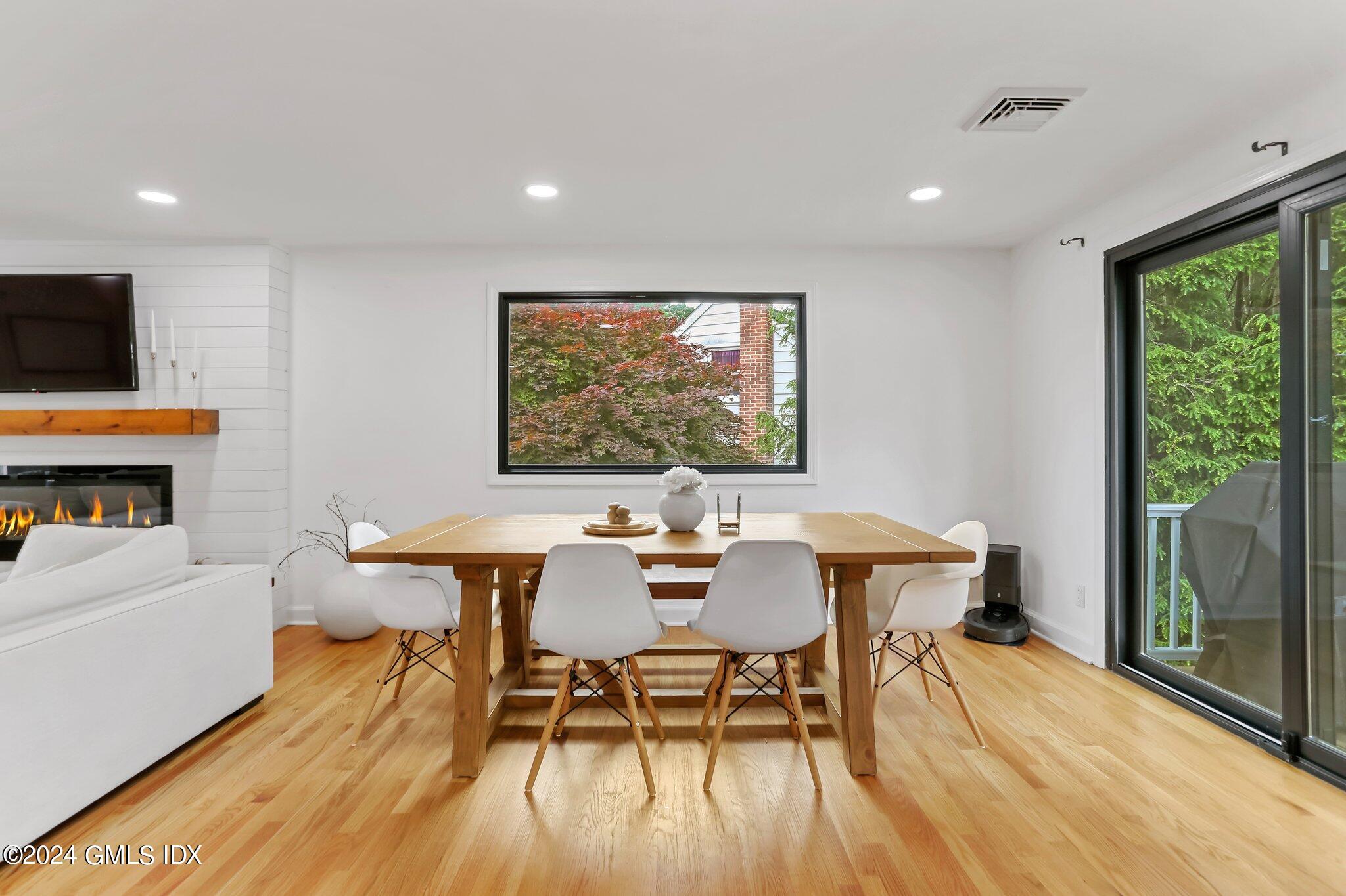 565 River Road Cos Cob, CT 06870 - Photo 6 of 29 a view of a dining room with furniture window and outside view