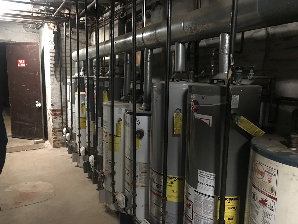 870 Pine Street Fall River, MA 02720 - Photo 12 of 19 a close view of water heater room