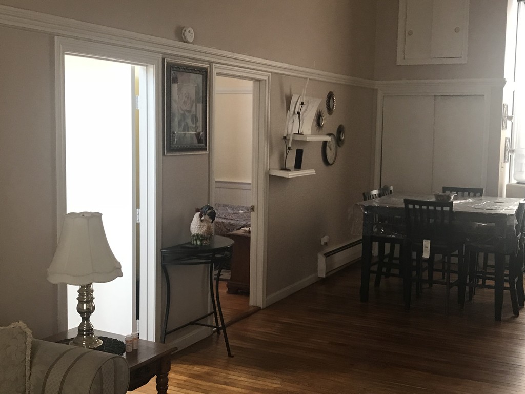 870 Pine Street Fall River, MA 02720 - Photo 17 of 19 a view of a workspace with furniture and wooden floor