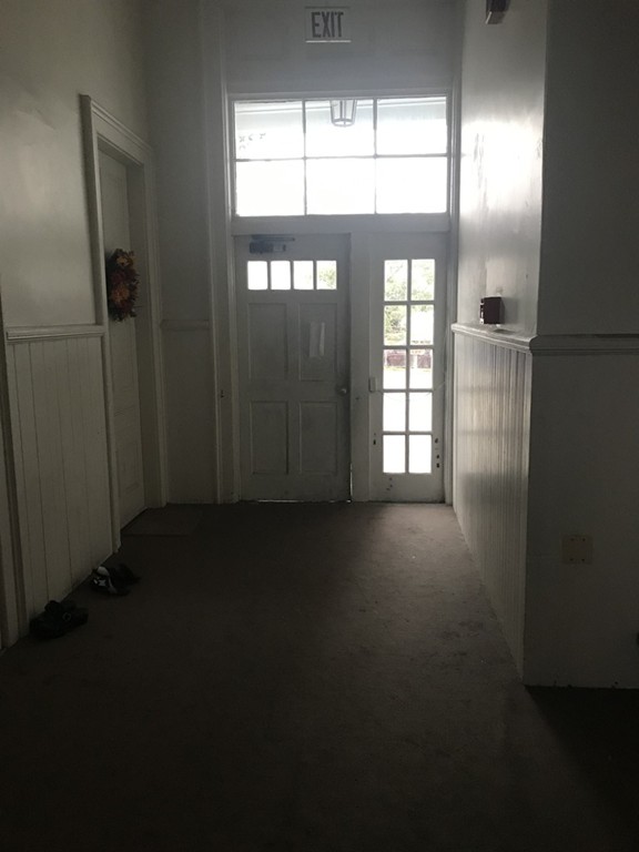 870 Pine Street Fall River, MA 02720 - Photo 3 of 19 a view of empty room with windows