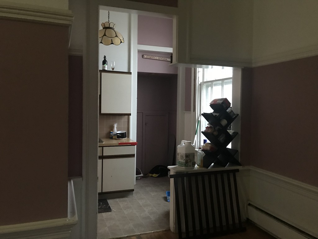 870 Pine Street Fall River, MA 02720 - Photo 5 of 19 a kitchen with a refrigerator and stove