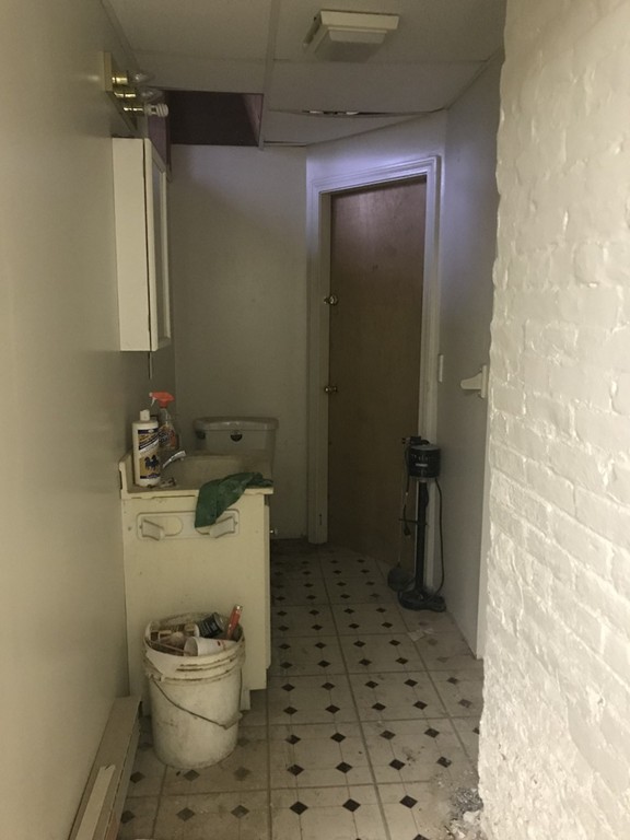 870 Pine Street Fall River, MA 02720 - Photo 10 of 19 a bathroom with a toilet and a shower