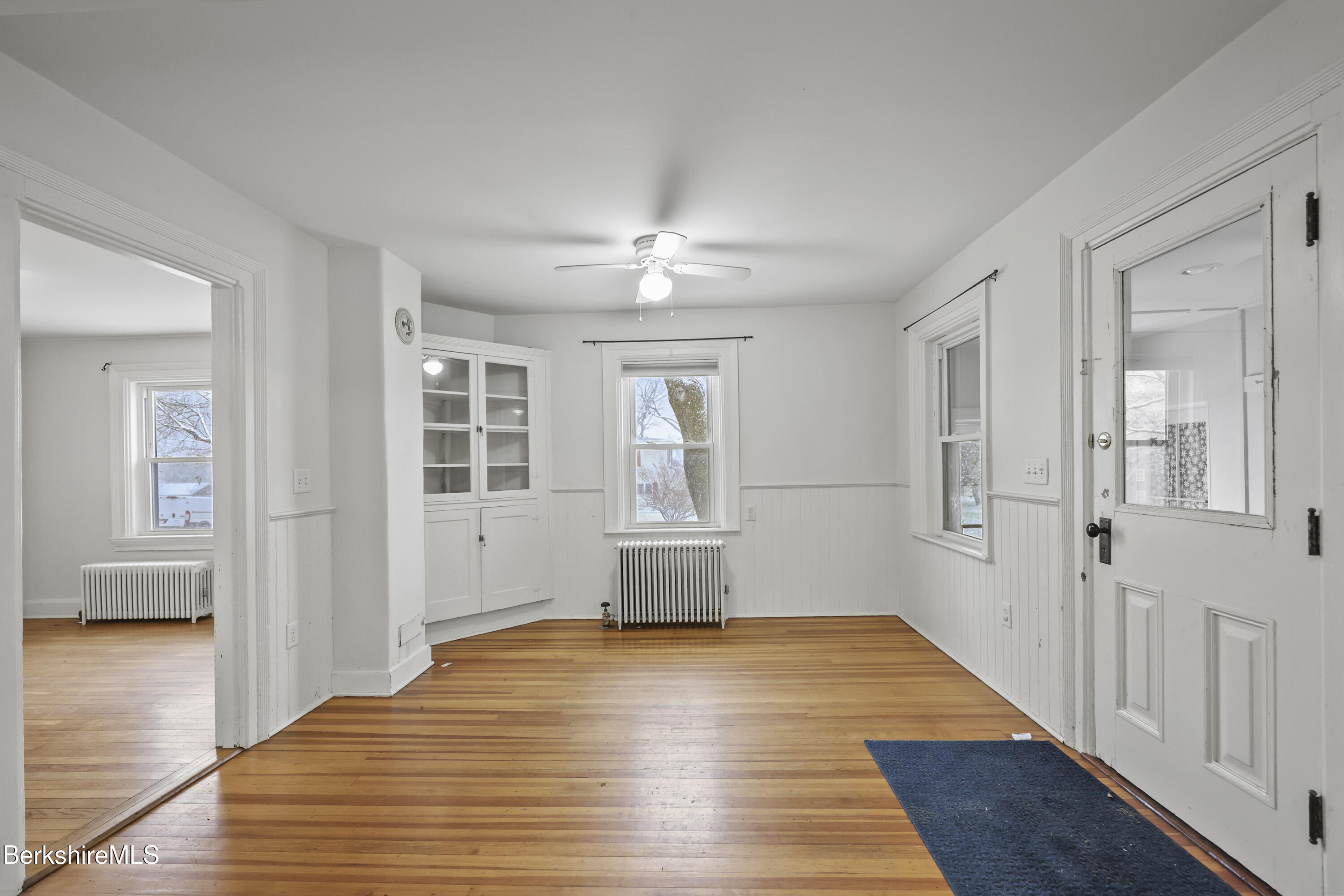 155 Laurel Street Lee, MA 01238 - Photo 18 of 43 a view of a room with wooden floor and window