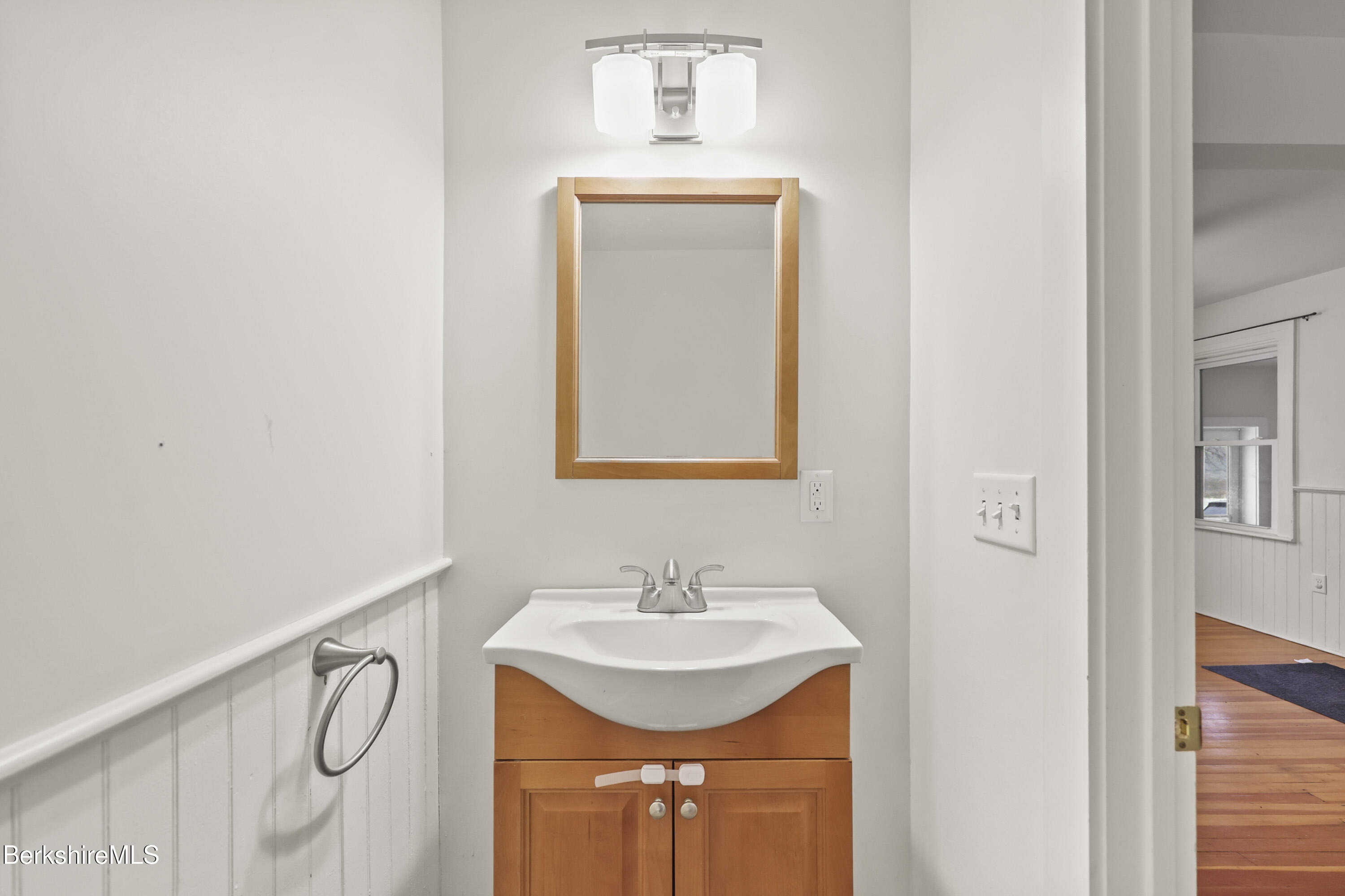 155 Laurel Street Lee, MA 01238 - Photo 25 of 43 a bathroom with a sink vanity and a mirror