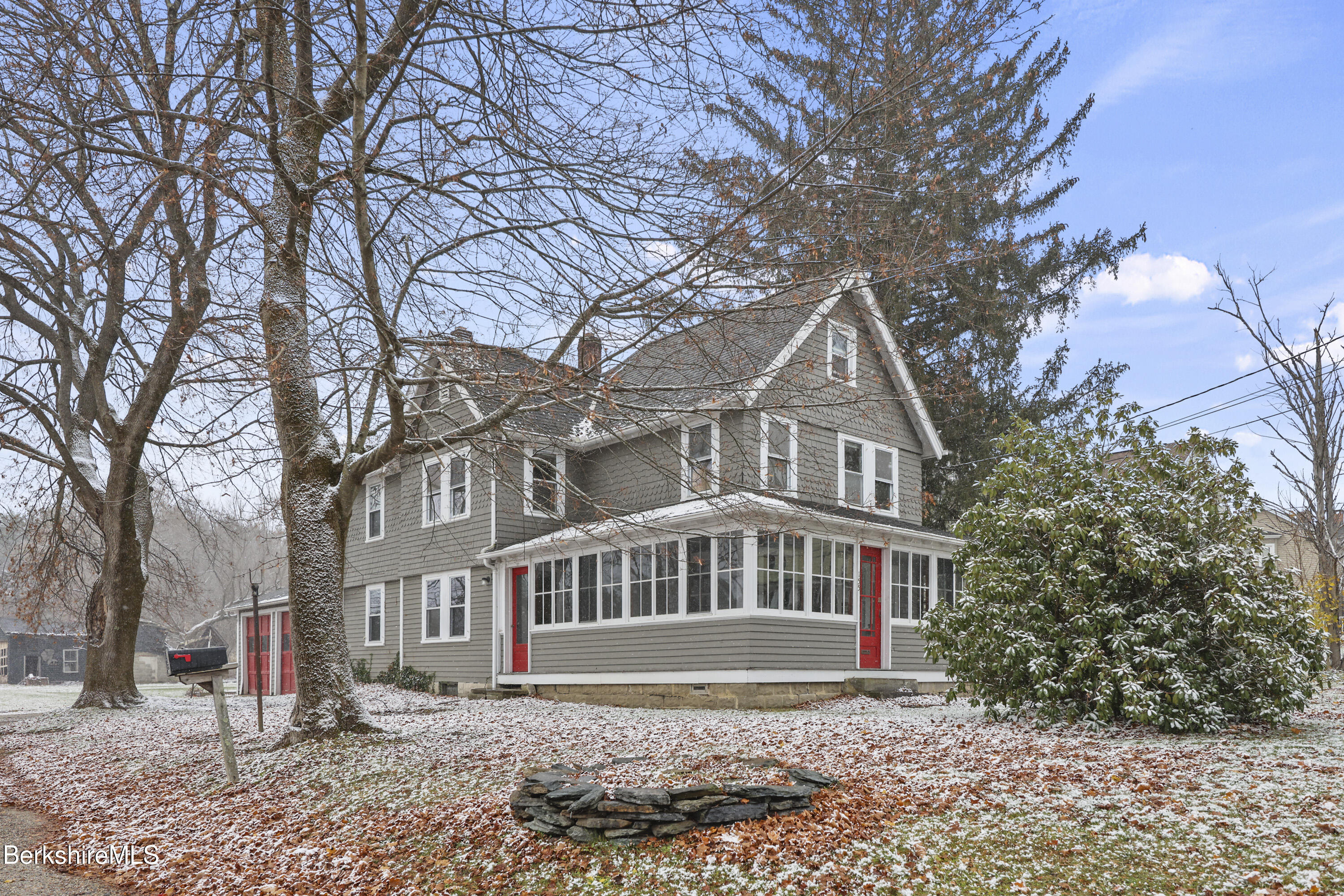155 Laurel Street Lee, MA 01238 - Photo 3 of 43 a front view of a house with a yard