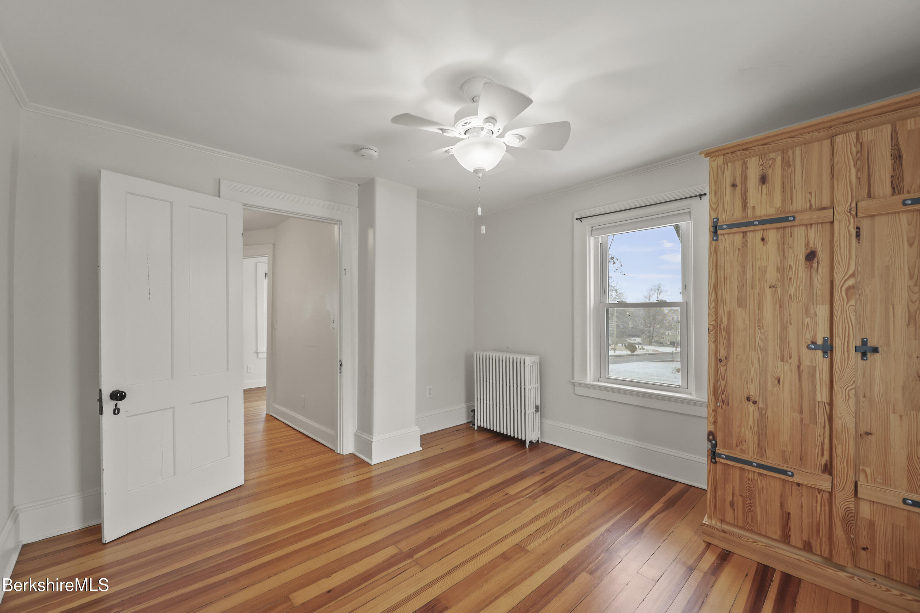 155 Laurel Street Lee, MA 01238 - Photo 35 of 43 wooden floor in an empty room with a window