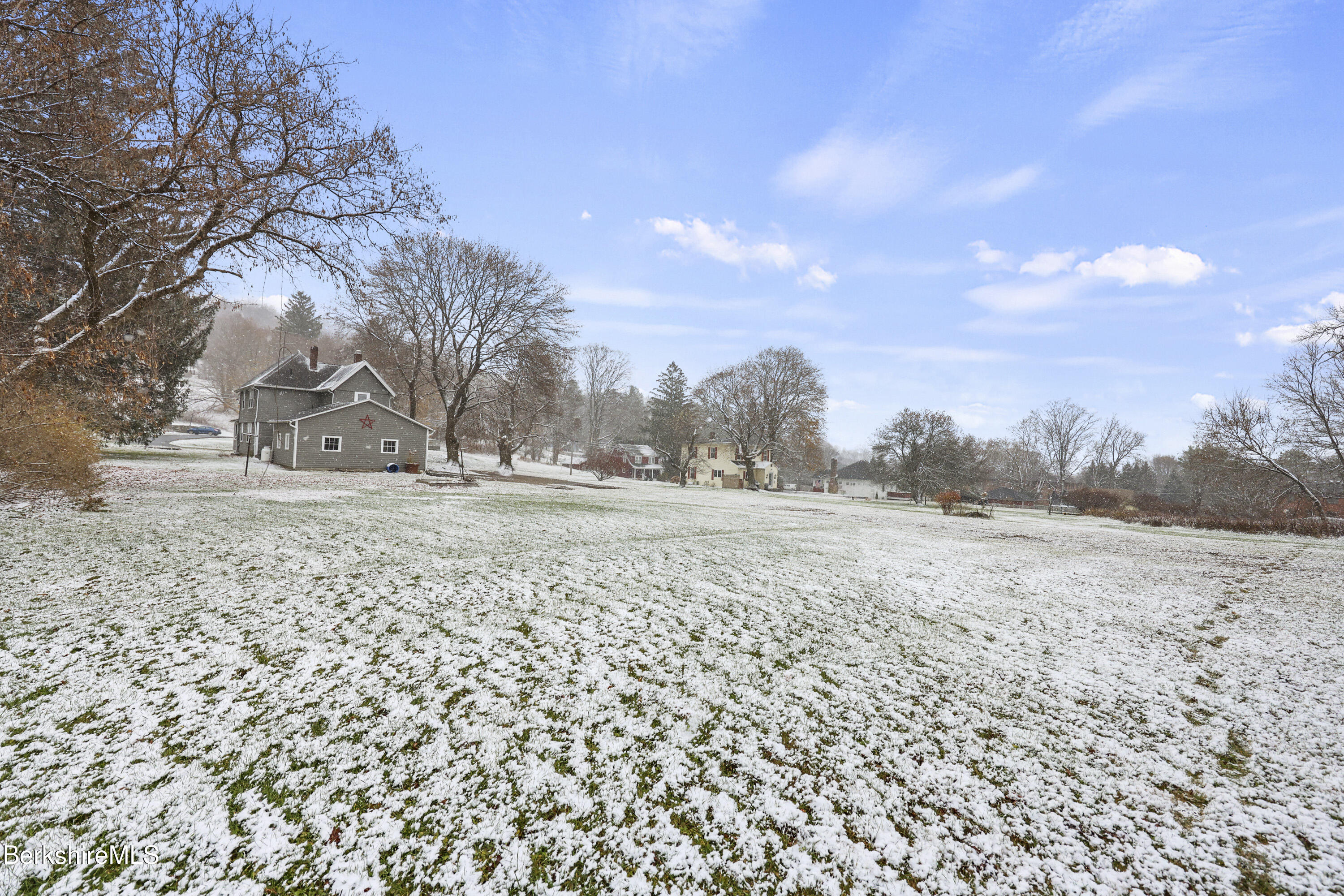 155 Laurel Street Lee, MA 01238 - Photo 43 of 43 a view of dirt field with trees