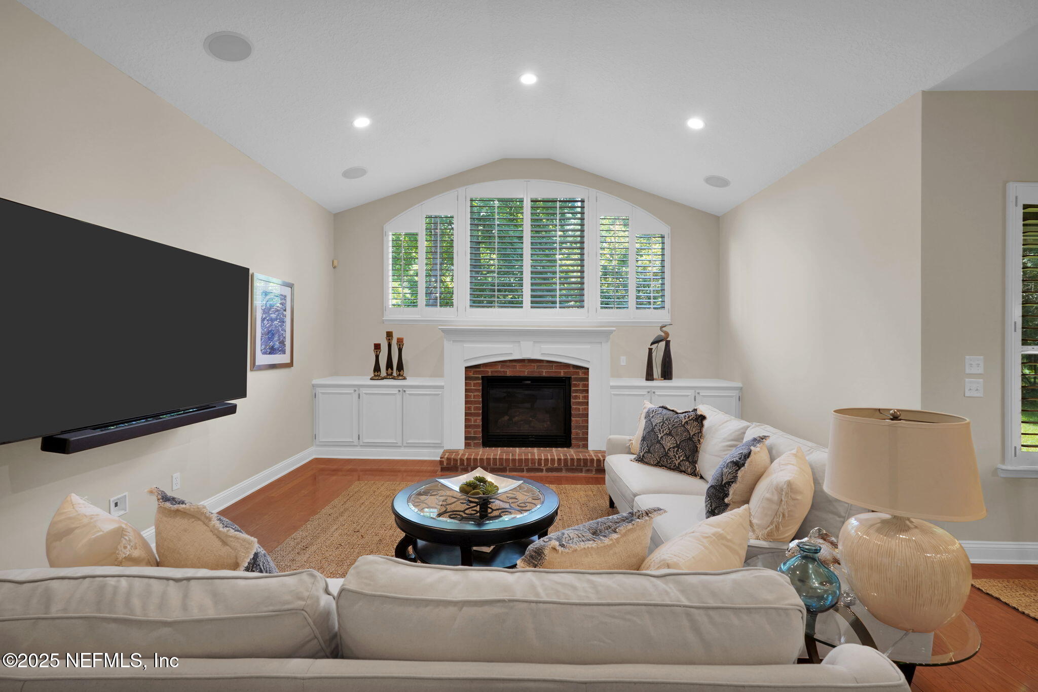 219 Parkside Drive St. Augustine, FL 32095 - Photo 17 of 67 a living room with furniture and a fireplace
