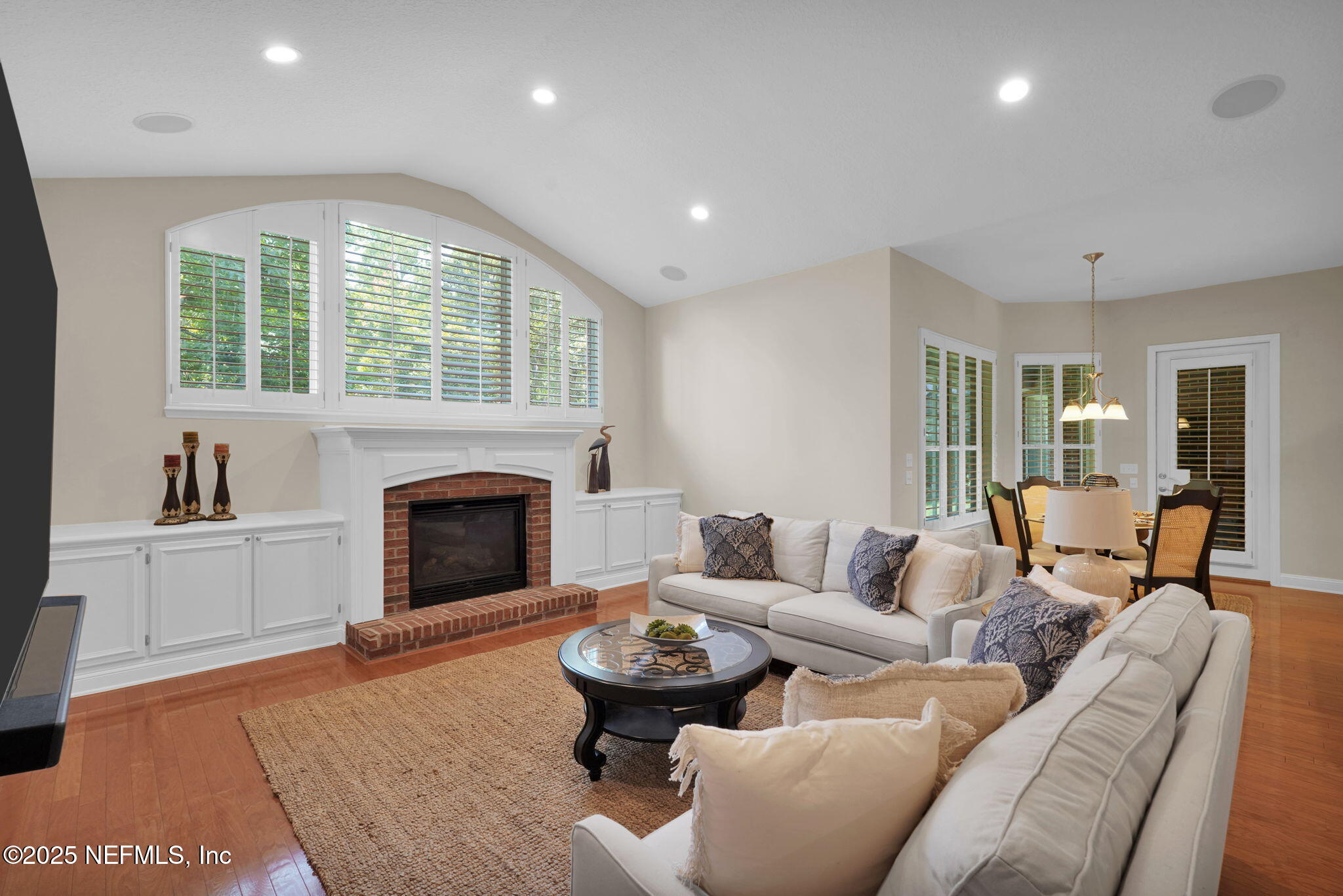 219 Parkside Drive St. Augustine, FL 32095 - Photo 18 of 67 a living room with furniture and a fireplace