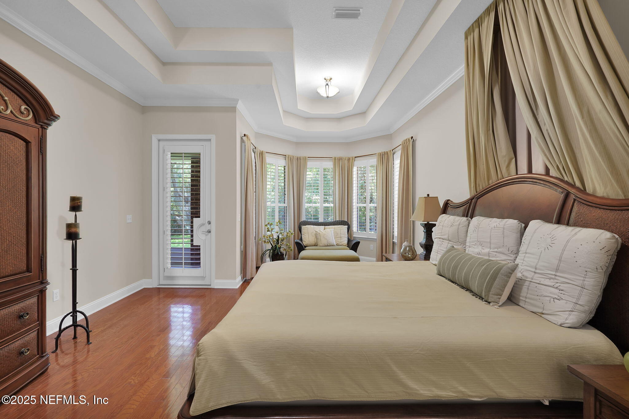 219 Parkside Drive St. Augustine, FL 32095 - Photo 26 of 67 a bedroom with a bed and a large window