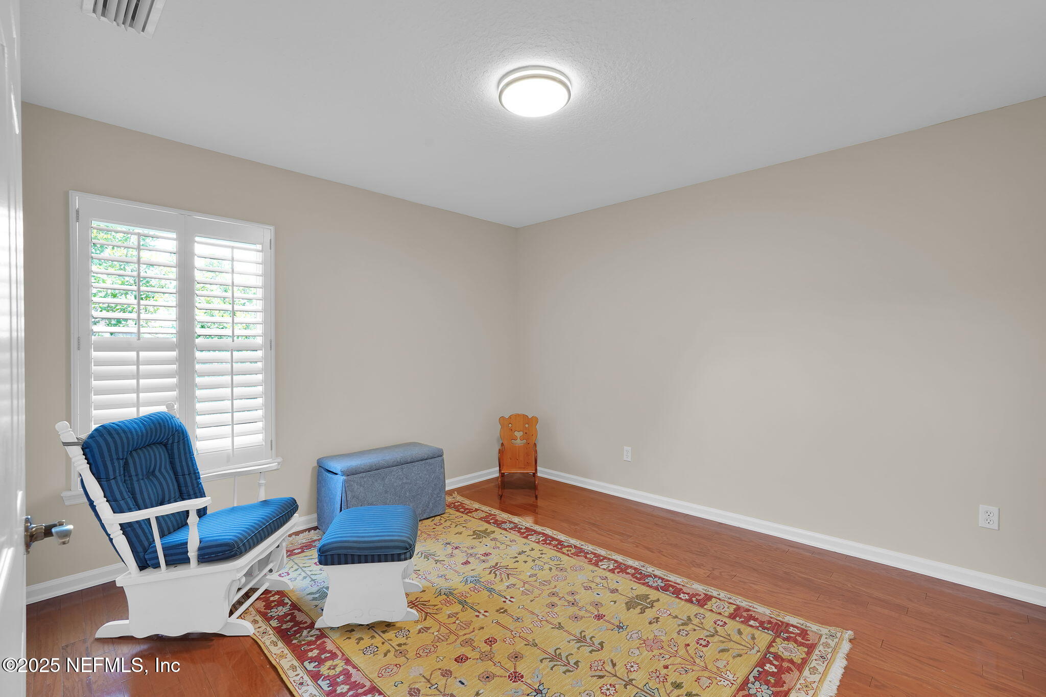 219 Parkside Drive St. Augustine, FL 32095 - Photo 41 of 67 a bed room with a bed and a chair