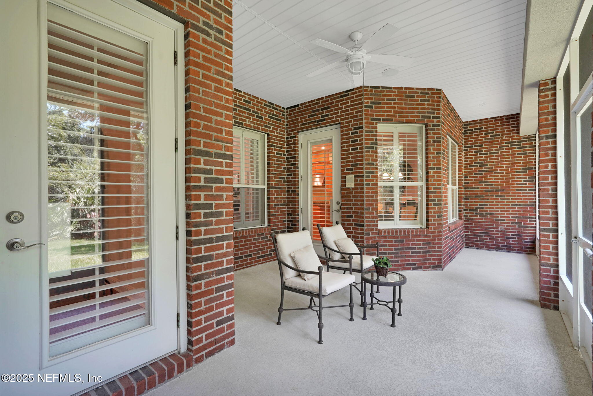 219 Parkside Drive St. Augustine, FL 32095 - Photo 47 of 67 a view of a balcony with chairs and table
