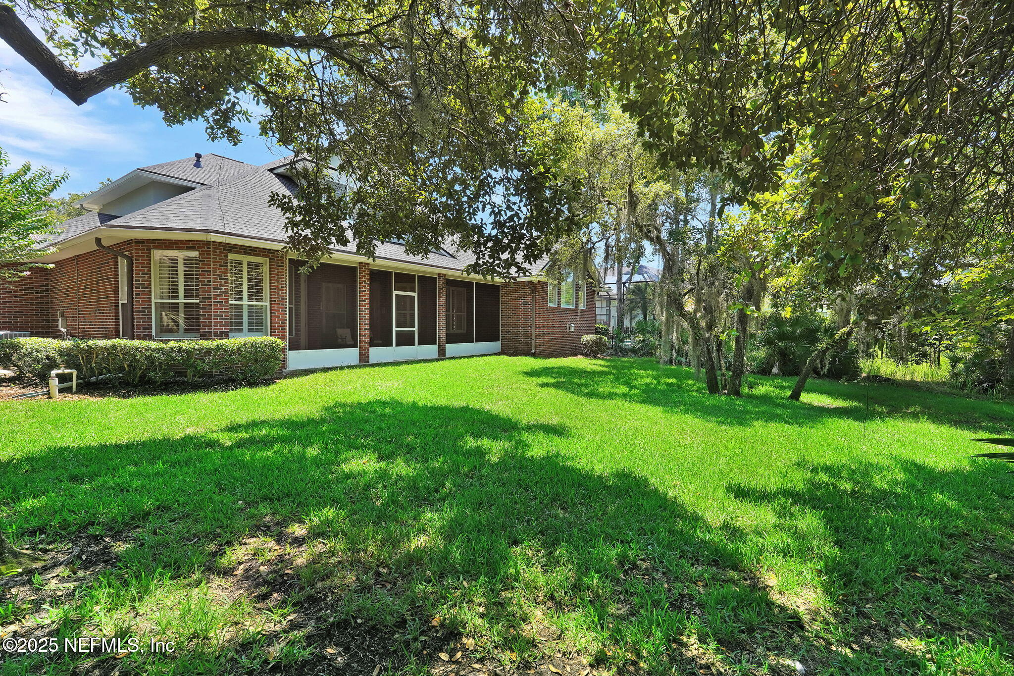 219 Parkside Drive St. Augustine, FL 32095 - Photo 49 of 67 a view of a house with yard and a garden