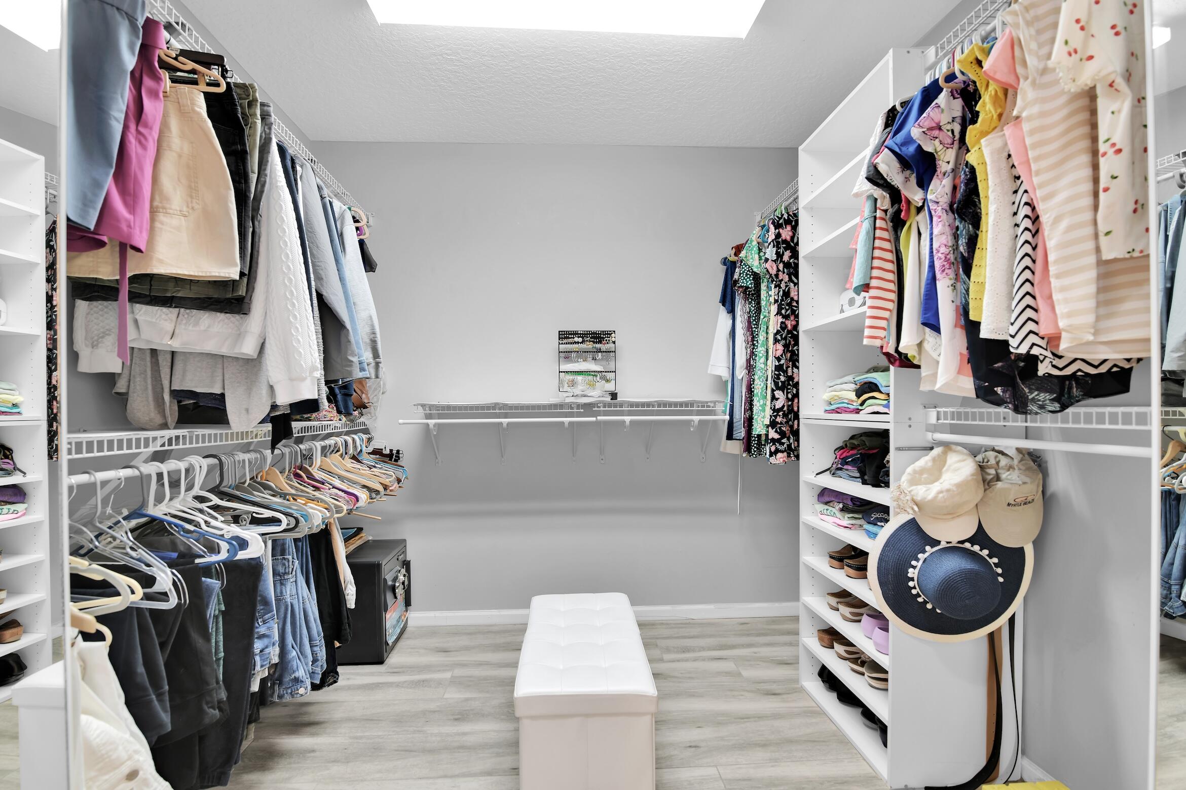 7458 Falls Road West Boynton Beach, FL 33437 - Photo 24 of 45 a view of walk in closet with clothes and shoes