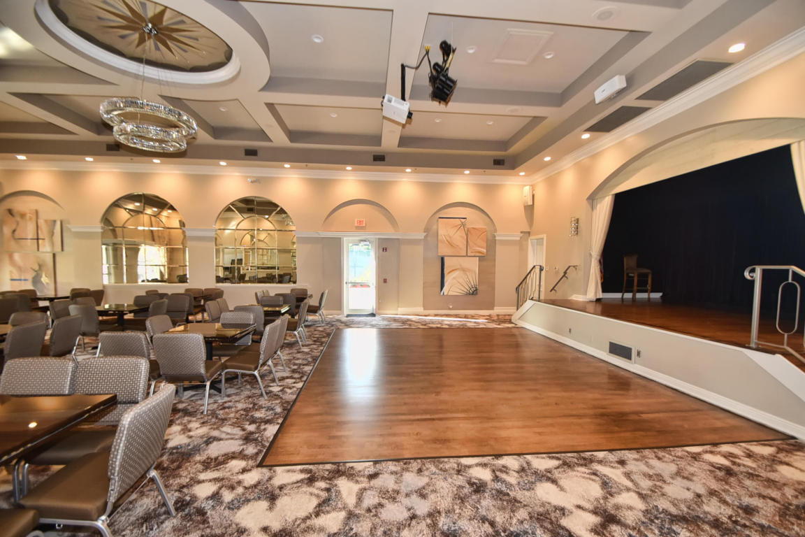 7458 Falls Road West Boynton Beach, FL 33437 - Photo 43 of 45 a view of a swimming pool with outdoor seating