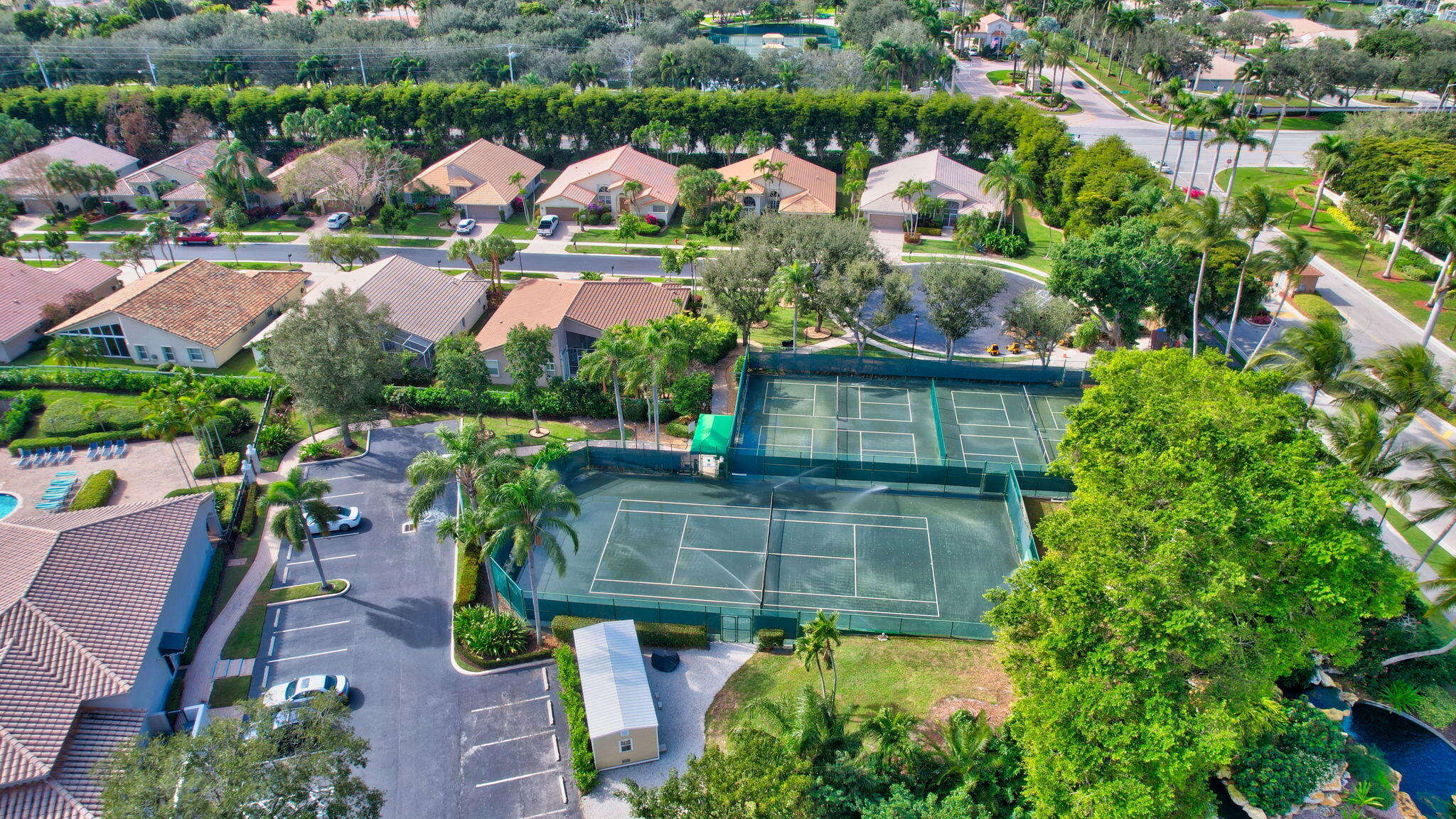 7458 Falls Road West Boynton Beach, FL 33437 - Photo 44 of 45 an aerial view of multiple houses with yard