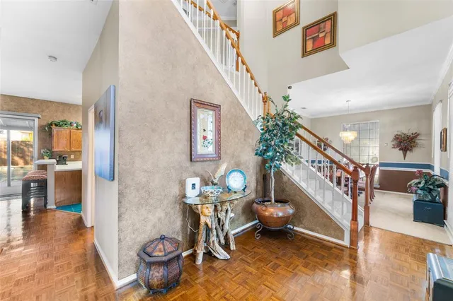 a view of entryway livingroom and hall