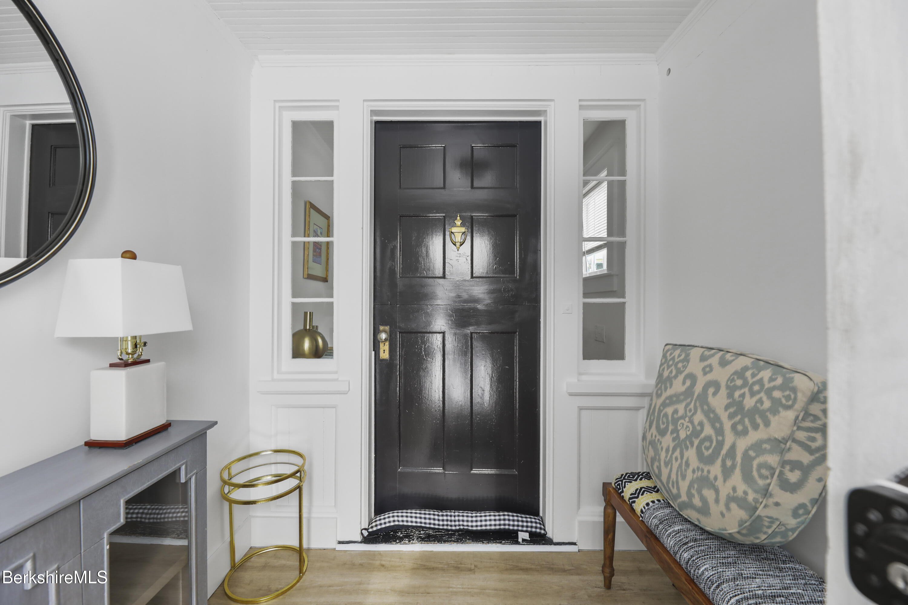 a view of an entryway with sitting area