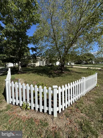 a view of a yard with an outdoor space