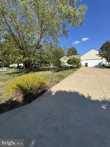 a view of swimming pool with a patio