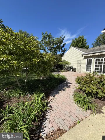 a view of a house with a garden