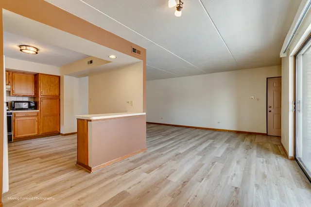 a view of workspace with wooden floor