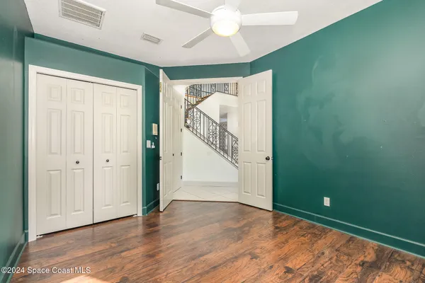 a view of entryway with wooden floor
