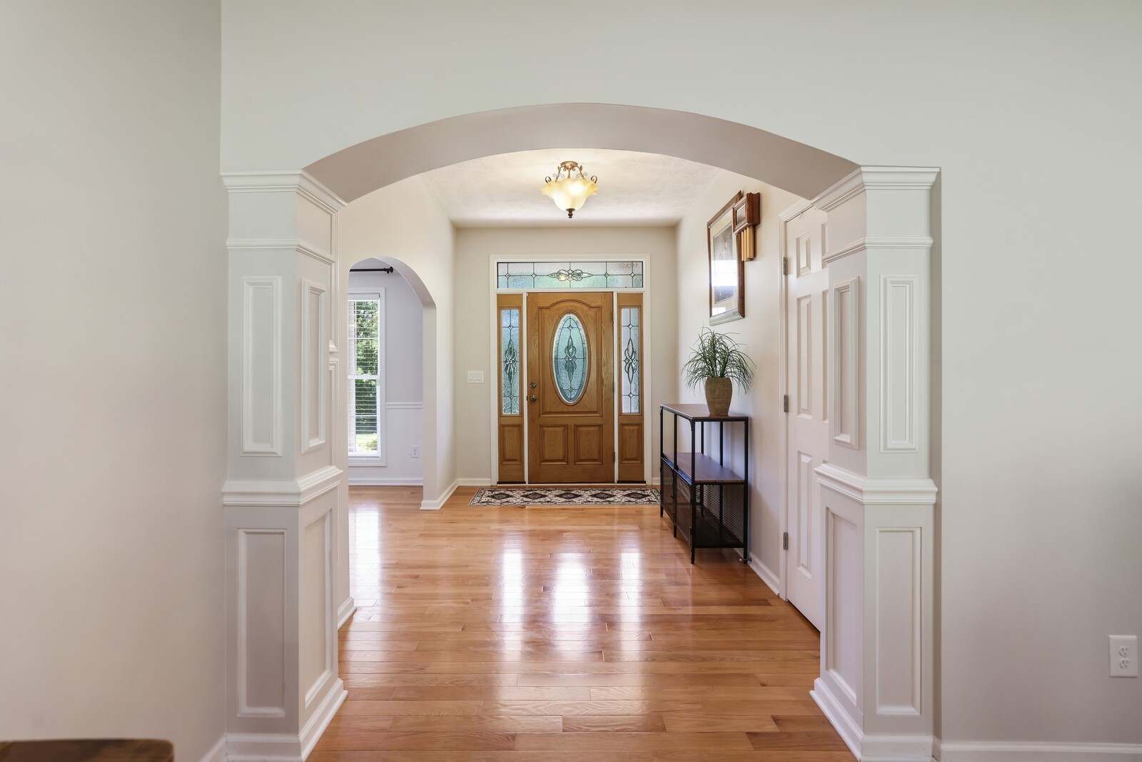 2219 Mack Benderman Road Culleoka, TN 38451 - Photo 3 of 40 a view of a hallway view with wooden floor and staircase