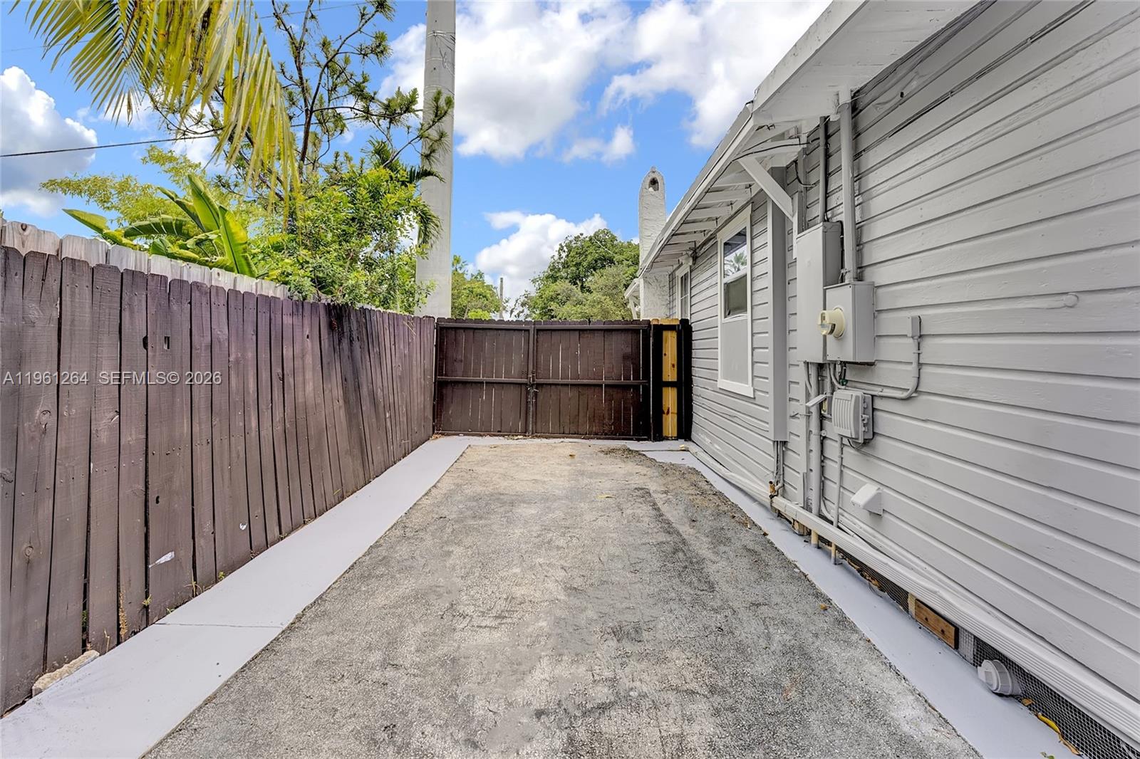 107 Stirling Road Dania Beach, FL 33004 - Photo 16 of 17 a view of a backyard