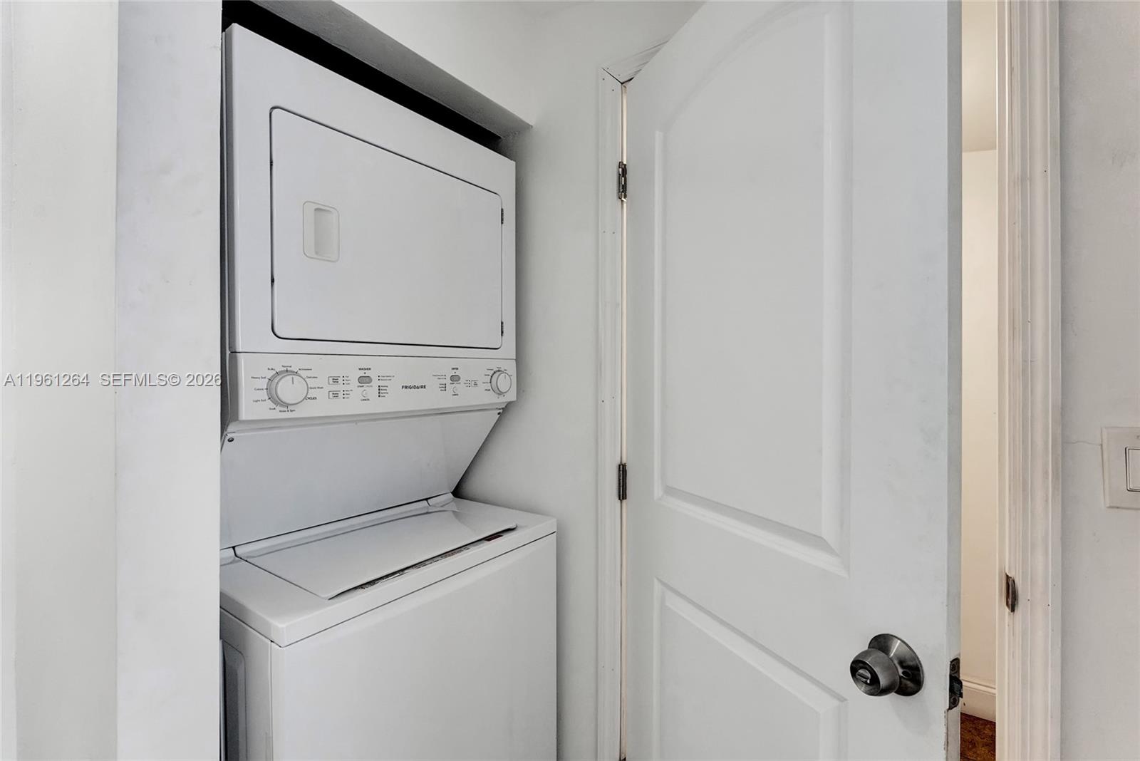 107 Stirling Road Dania Beach, FL 33004 - Photo 17 of 17 a close up view of a washer and dryer
