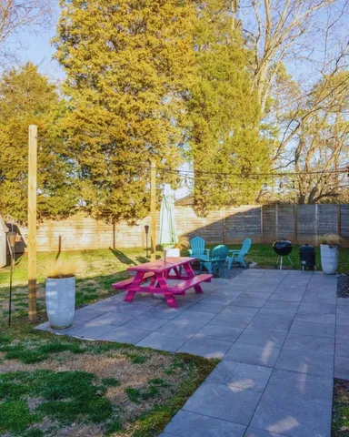 a view of yard with outdoor seating