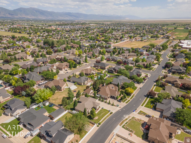 2327 Bluff Ridge Drive Syracuse, UT 84075 - Photo 61 of 66 Residential neighborhood with established homes and mature landscaping