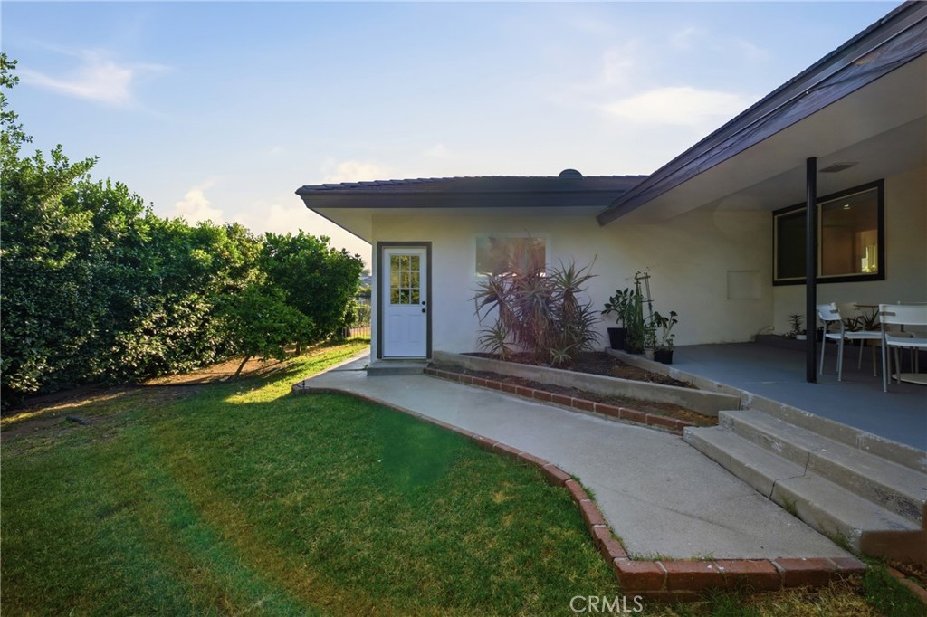 384 Colorado Street Arcadia, CA 91007 - Photo 18 of 51 a backyard of a house with table and chairs