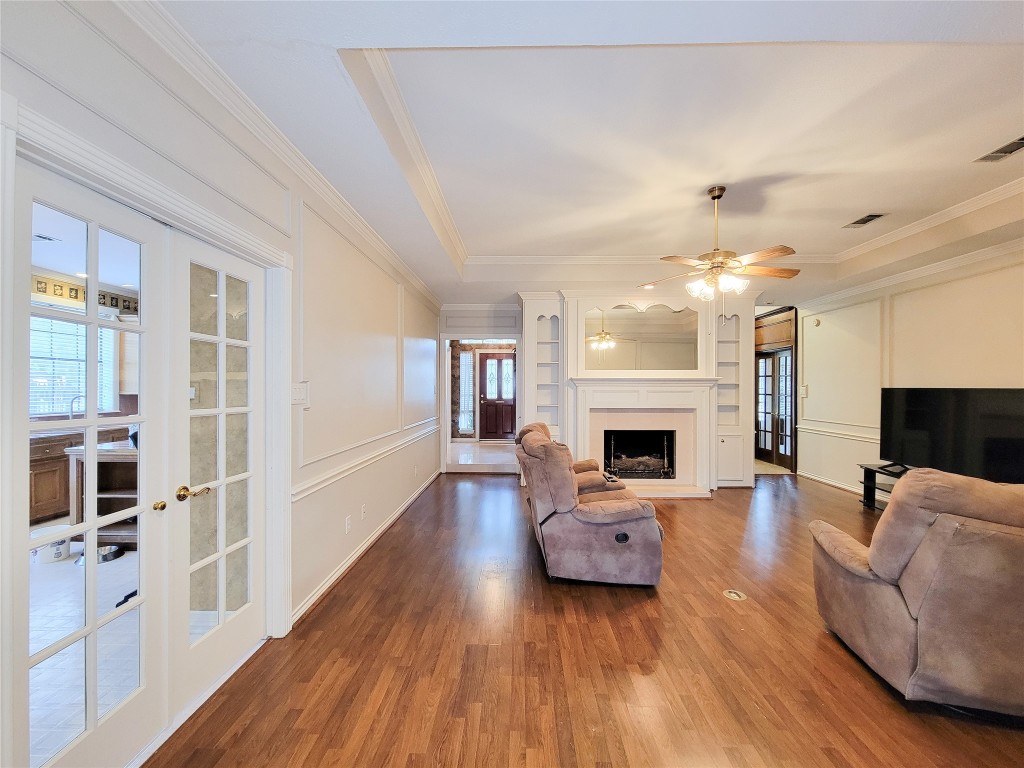 5810 Glenmere Lane Spring, TX 77379 - Photo 12 of 46 a living room with furniture and a fireplace