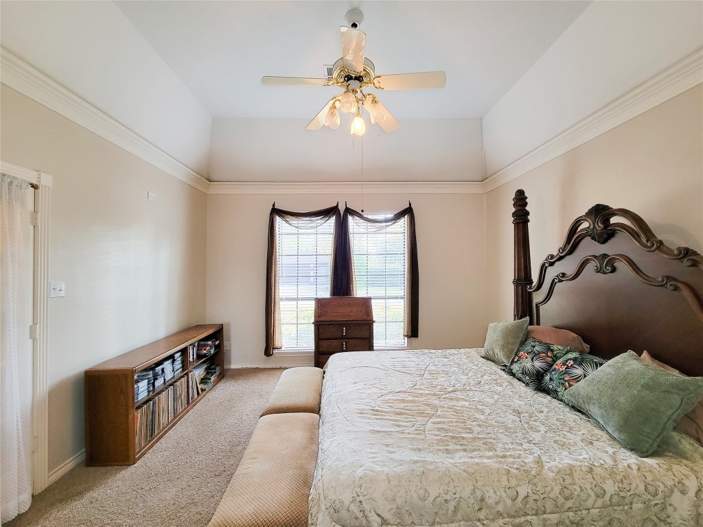 5810 Glenmere Lane Spring, TX 77379 - Photo 24 of 46 a bedroom with a large bed and a window