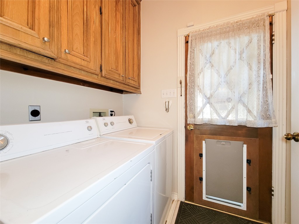 5810 Glenmere Lane Spring, TX 77379 - Photo 36 of 46 a utility room with dryer and washer