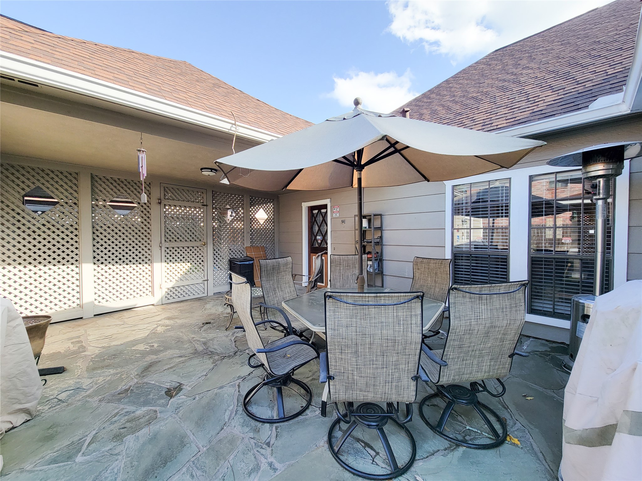 5810 Glenmere Lane Spring, TX 77379 - Photo 46 of 46 a view of a patio with table and chairs