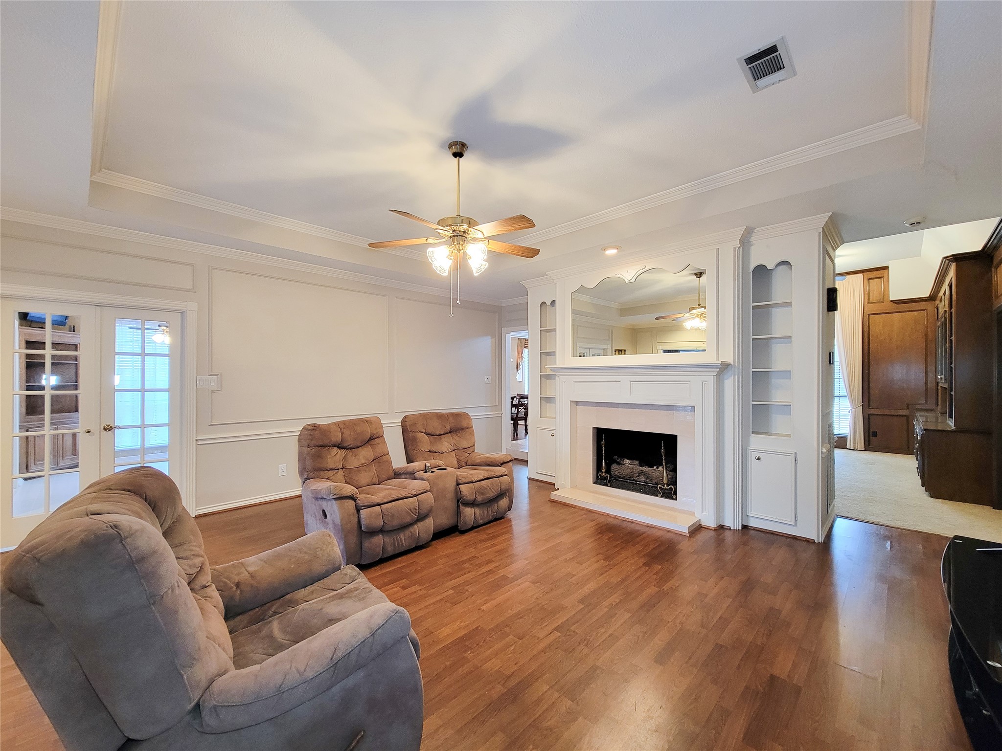 5810 Glenmere Lane Spring, TX 77379 - Photo 5 of 46 a living room with furniture and a fireplace