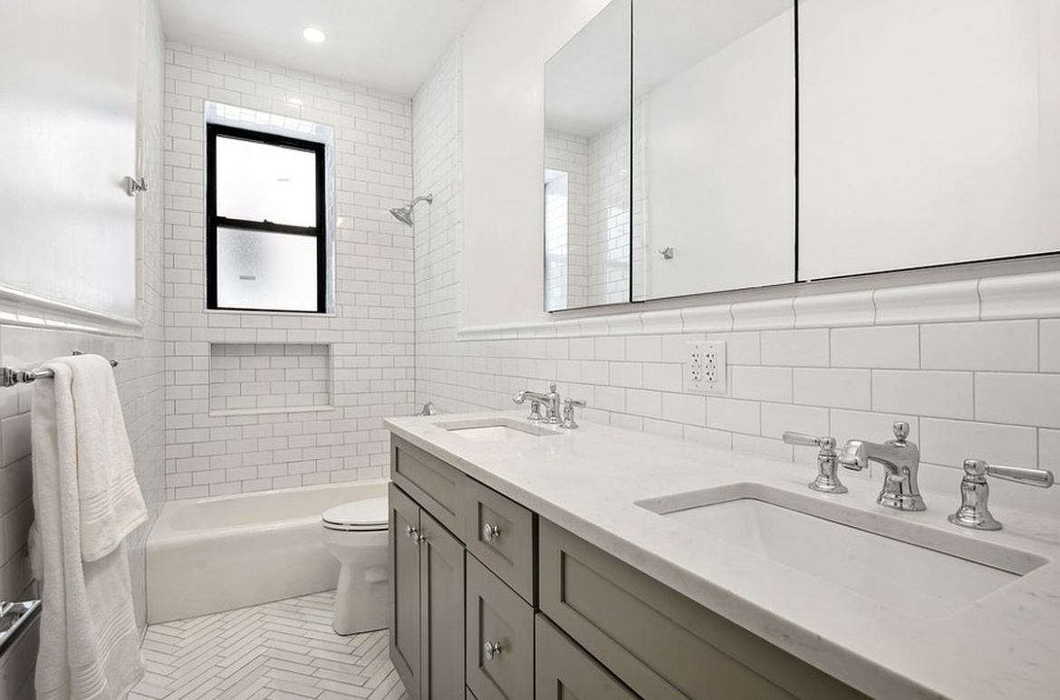 575 Riverside Drive, Unit 42 Manhattan, NY 10031 - Photo 11 of 12 a bathroom with a sink toilet tub and shower