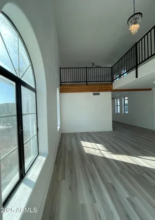 a living room with a couch and a fireplace