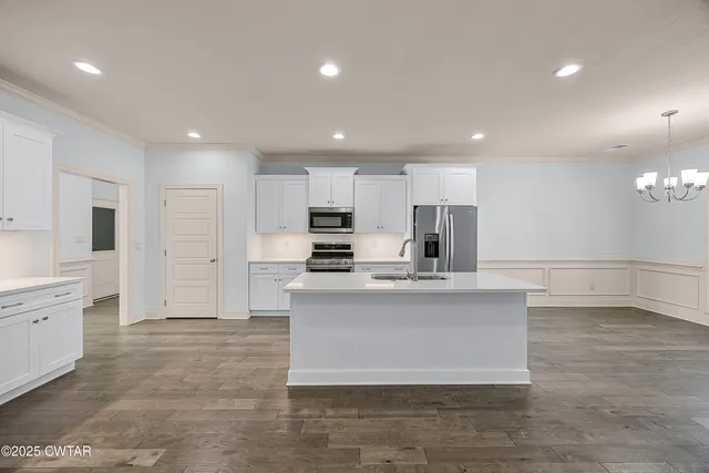 a large kitchen with cabinets