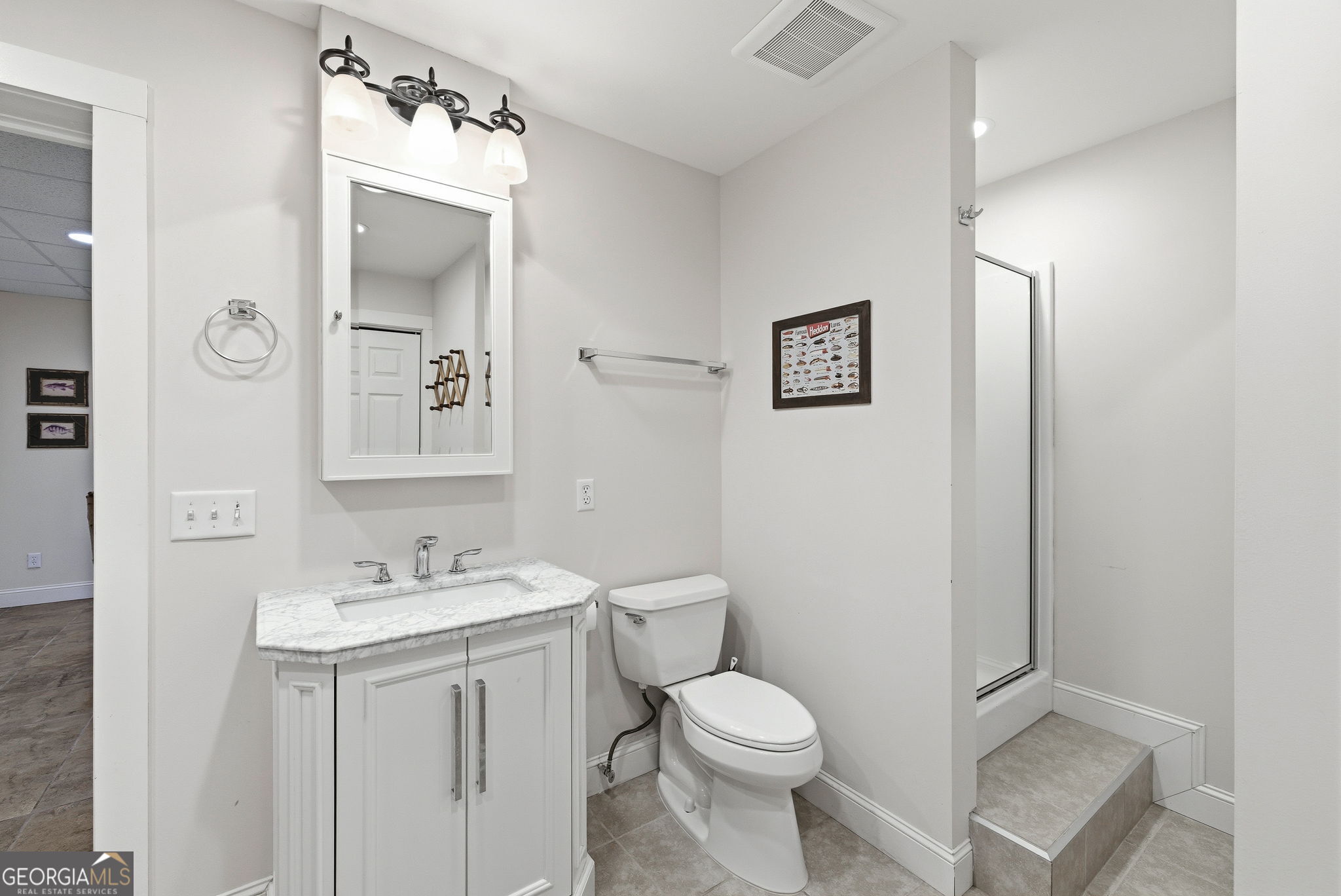 634 Little Hawk Road Sautee Nacoochee, GA 30571 - Photo 41 of 54 a bathroom with a toilet sink vanity and mirror