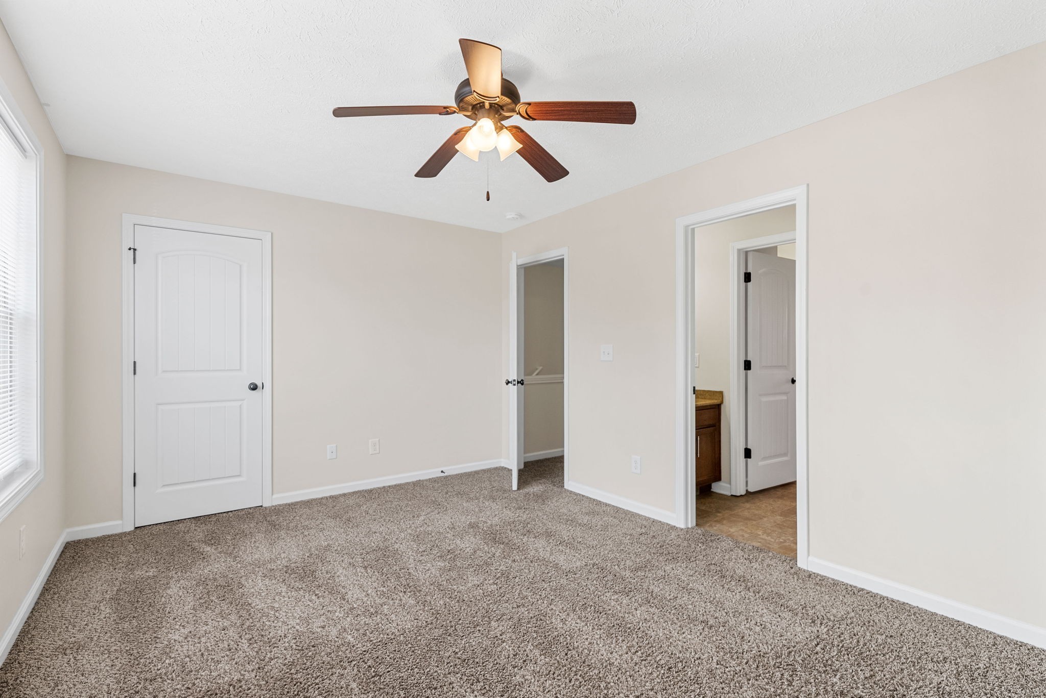 770 Needmore Road, Unit 18 Clarksville, TN 37040 - Photo 13 of 20 a view of a livingroom with a ceiling fan and entryway
