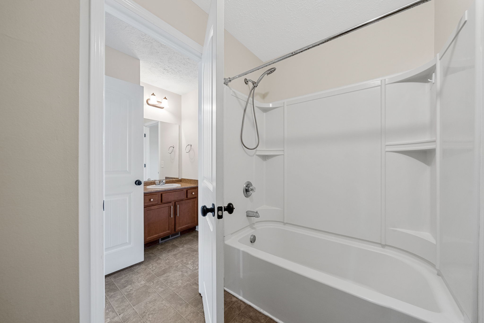 770 Needmore Road, Unit 18 Clarksville, TN 37040 - Photo 15 of 20 a spacious bathroom with a bathtub and a shower