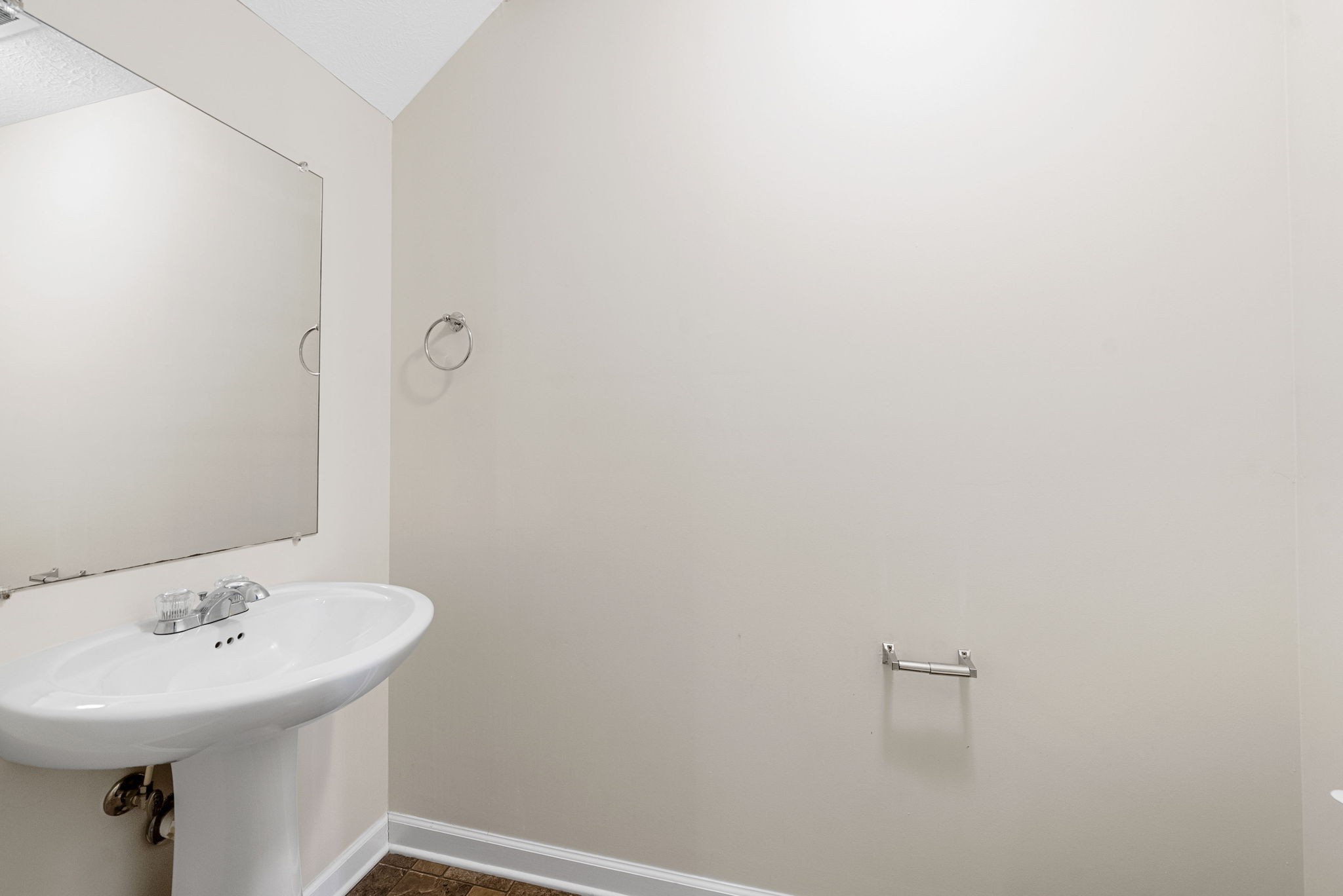770 Needmore Road, Unit 18 Clarksville, TN 37040 - Photo 10 of 20 a bathroom with a sink a mirror and a toilet