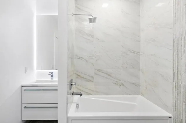 a bathroom with a bathtub