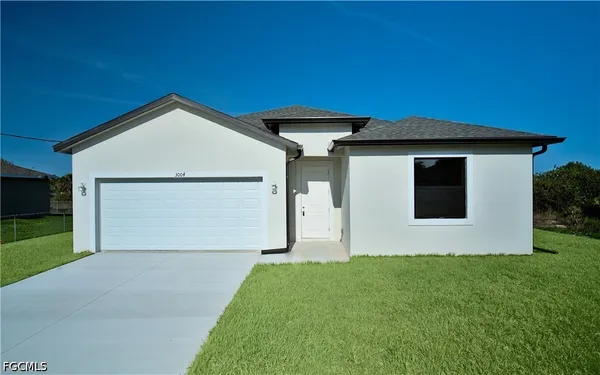 a front view of house with yard