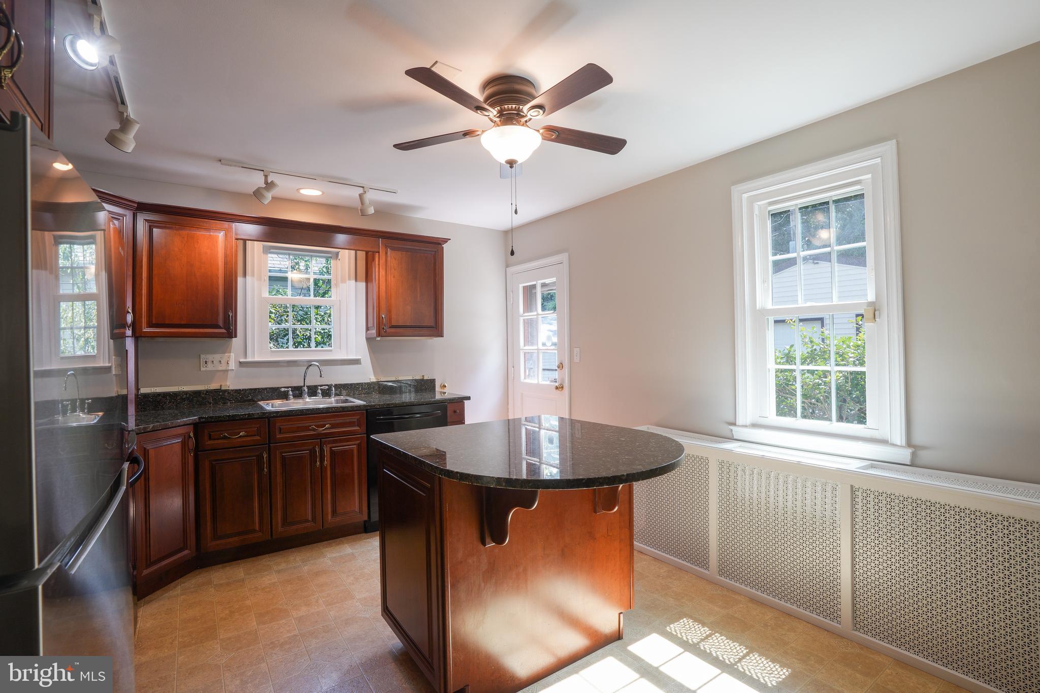 616 Warwick Road Baltimore, MD 21229 - Photo 16 of 32 Back door to yard and garage